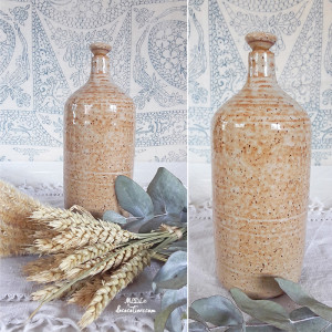 « Délicate bouteille en terre chamottée » type Soliflore