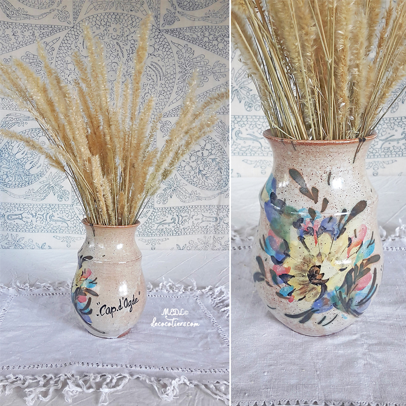 « Très beau vase du Cap d'Agde avec sa décoration florale »